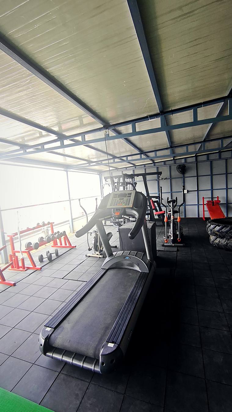 Treadmill in the rooftop gym — Vaikuntum Elite Co-Living