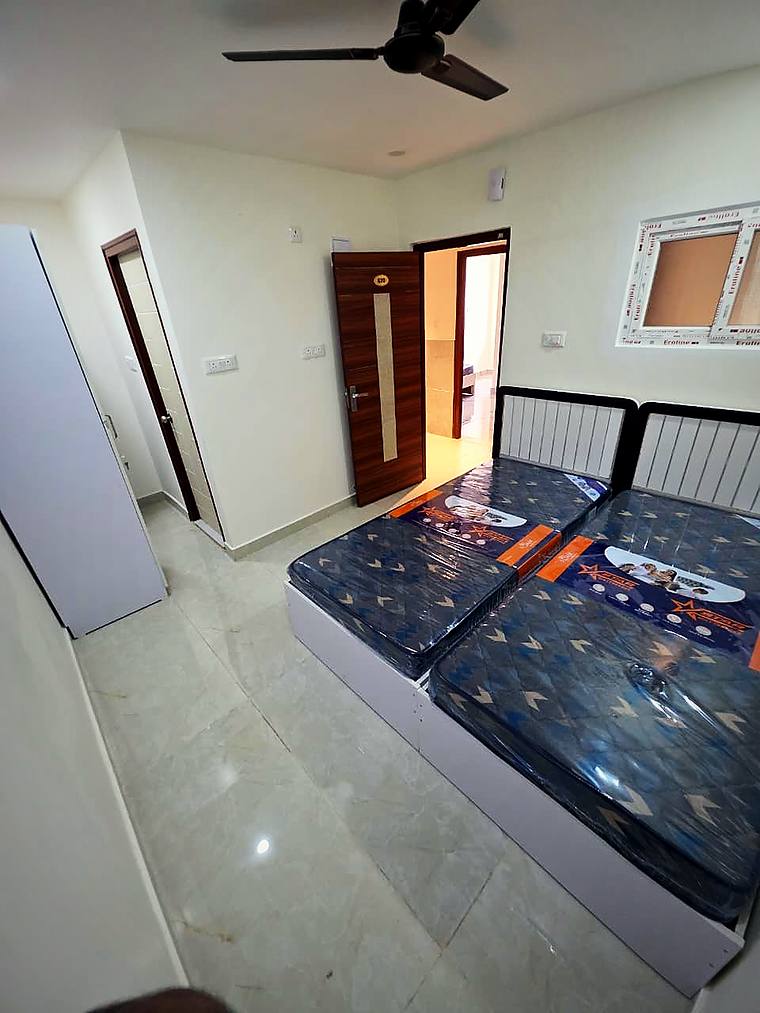 Two Share · XL — beds with headboards and window — Vaikuntum Elite Co-Living